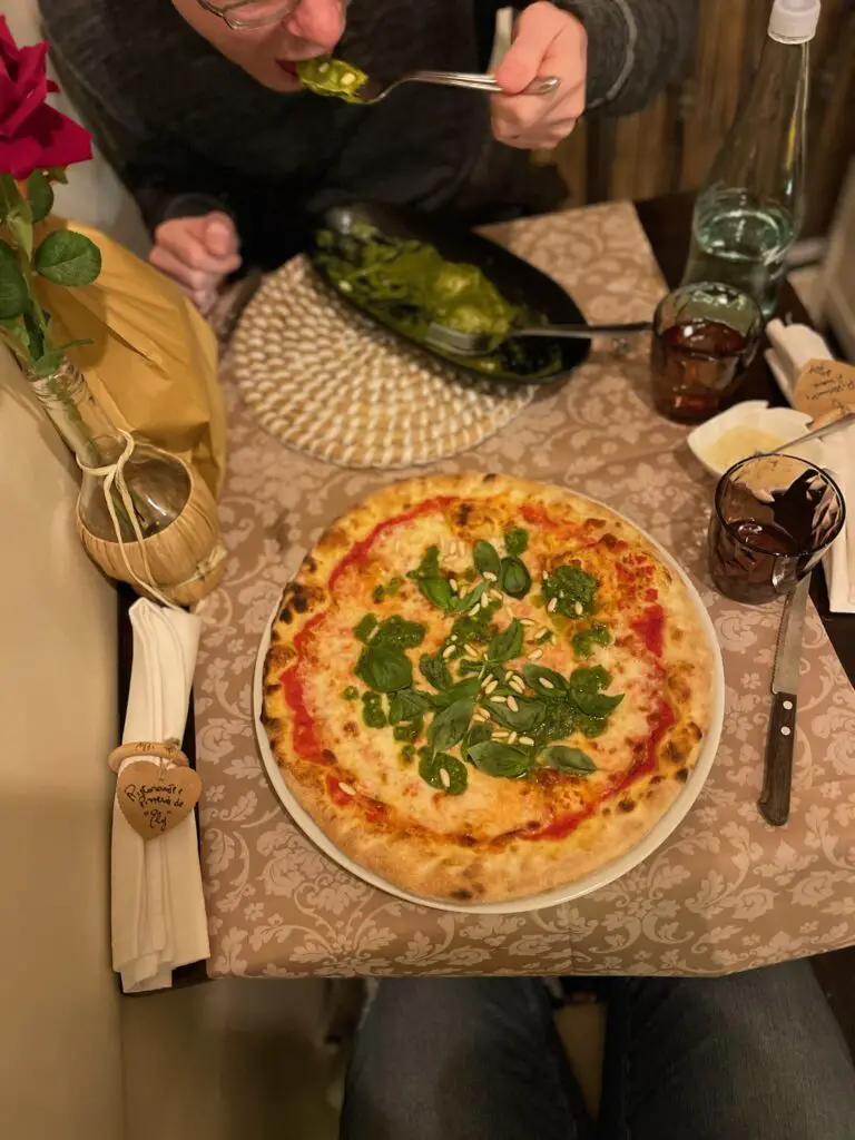 Pizza with pesto and topped with pesto, pesto ravioli